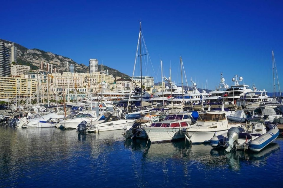 Sunlight reflecting off the crystal blue waters of Monaco