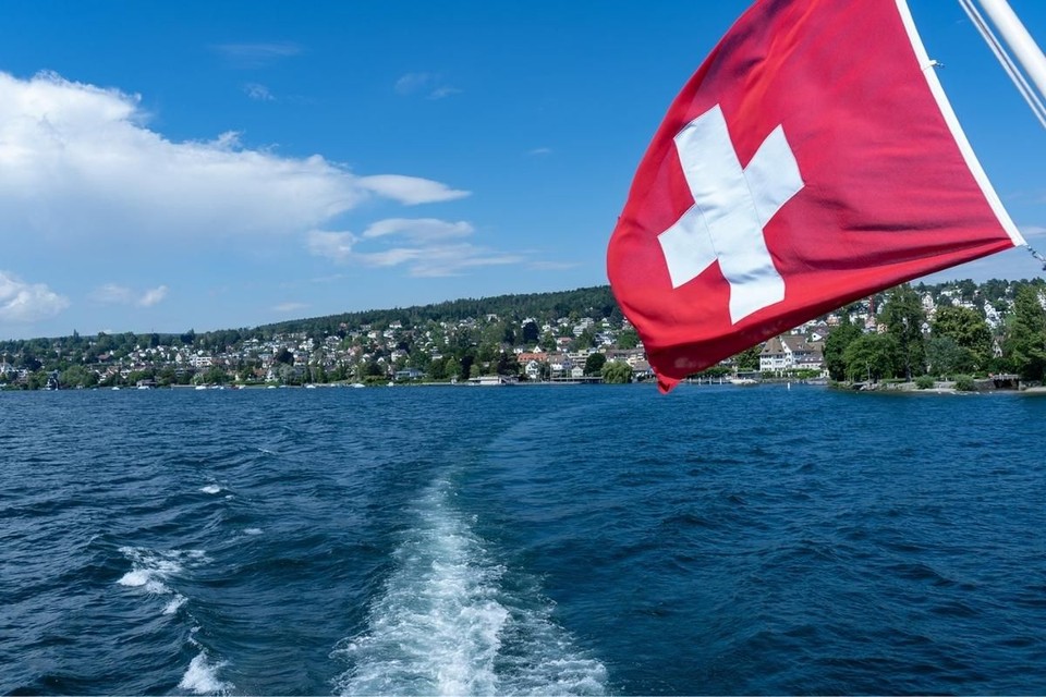 Flag of Switzerland and famouse Zurich Lake